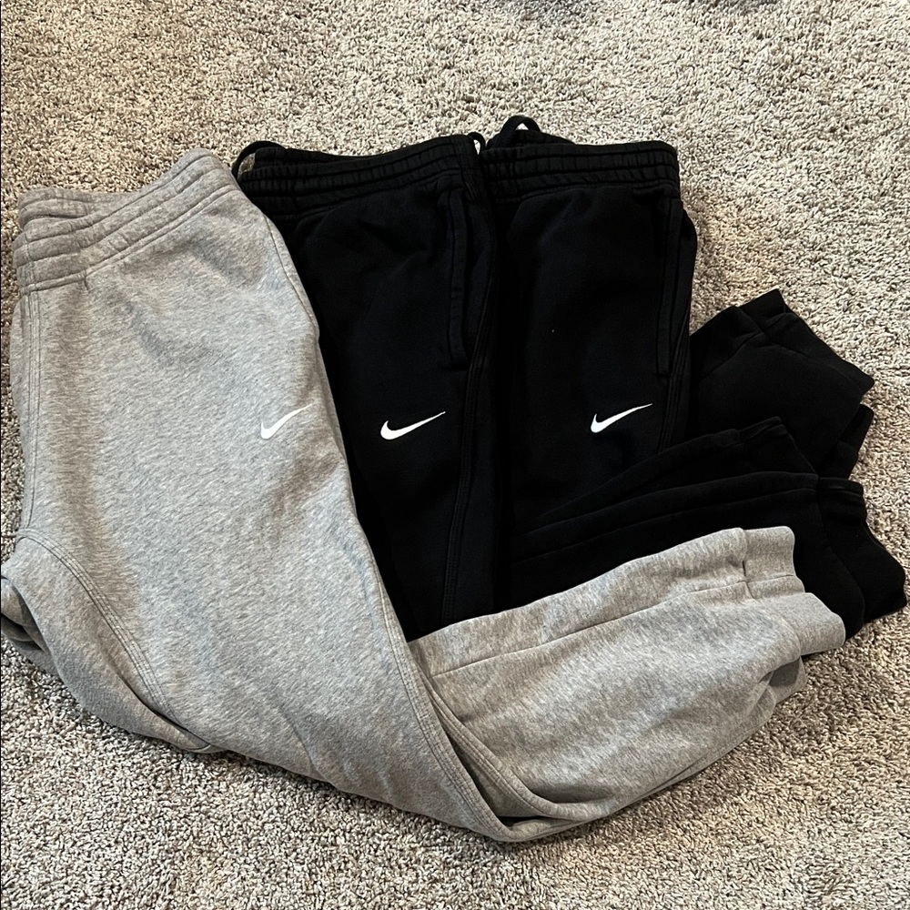 THREE Nike Men’s Black and Gray Joggers